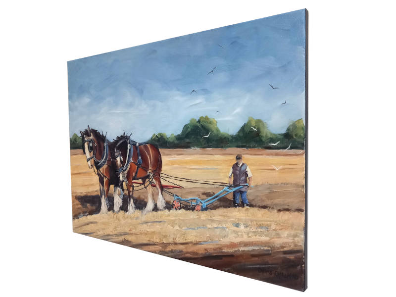 horses ploughing painting close up hanging on the wall