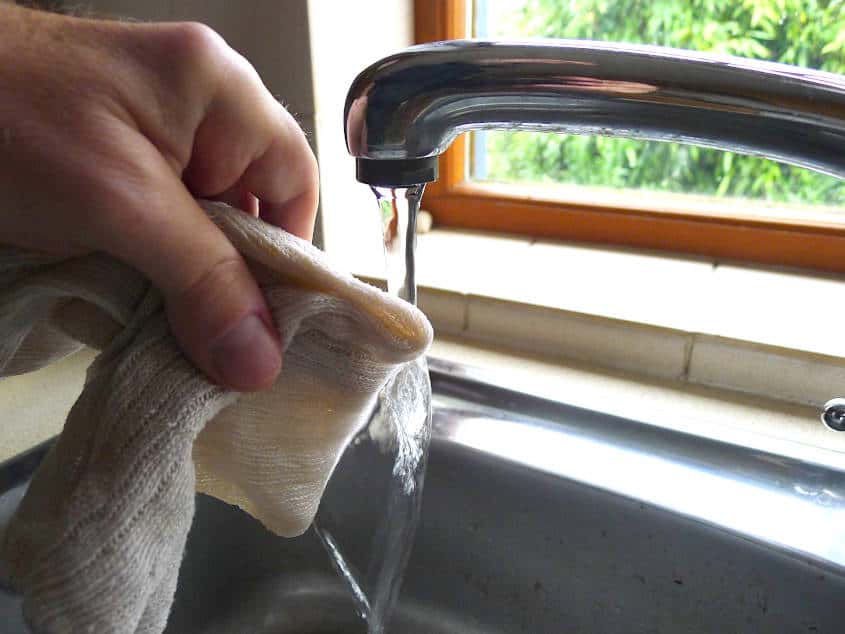 Wet rag in sink.