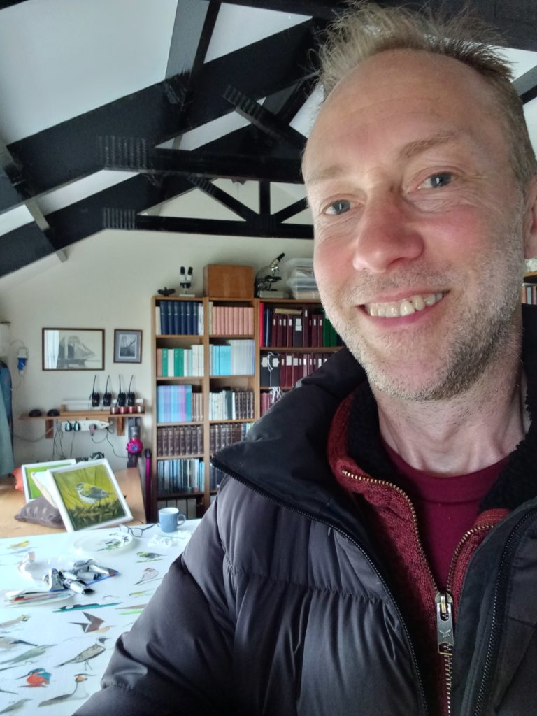 Artist Chris Chalk painting birds on Skokholm Island